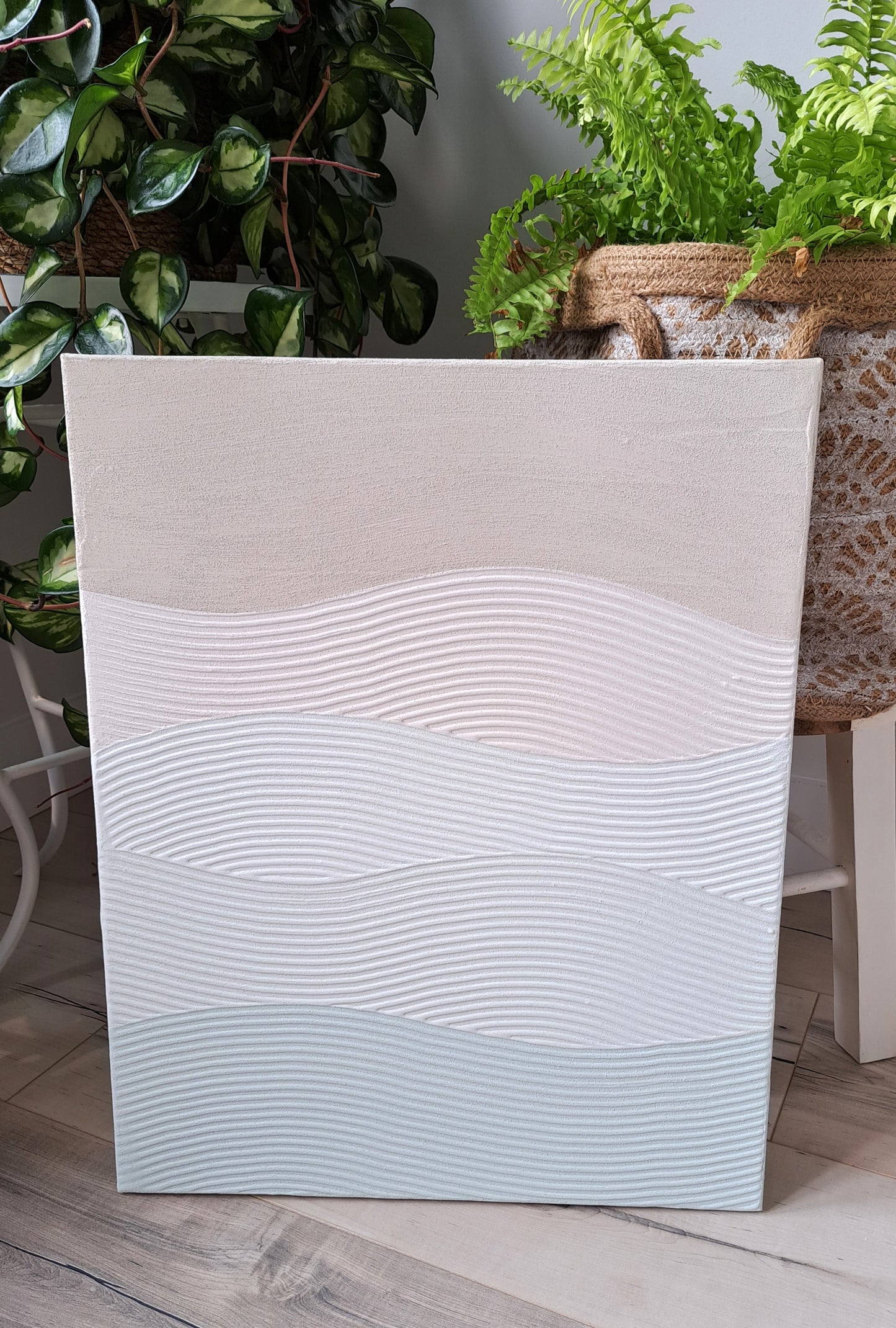 This gradient wave textured piece is made with sand for an authentic beachy feel. Highly textured, with colours ranging from light beige to light blue.