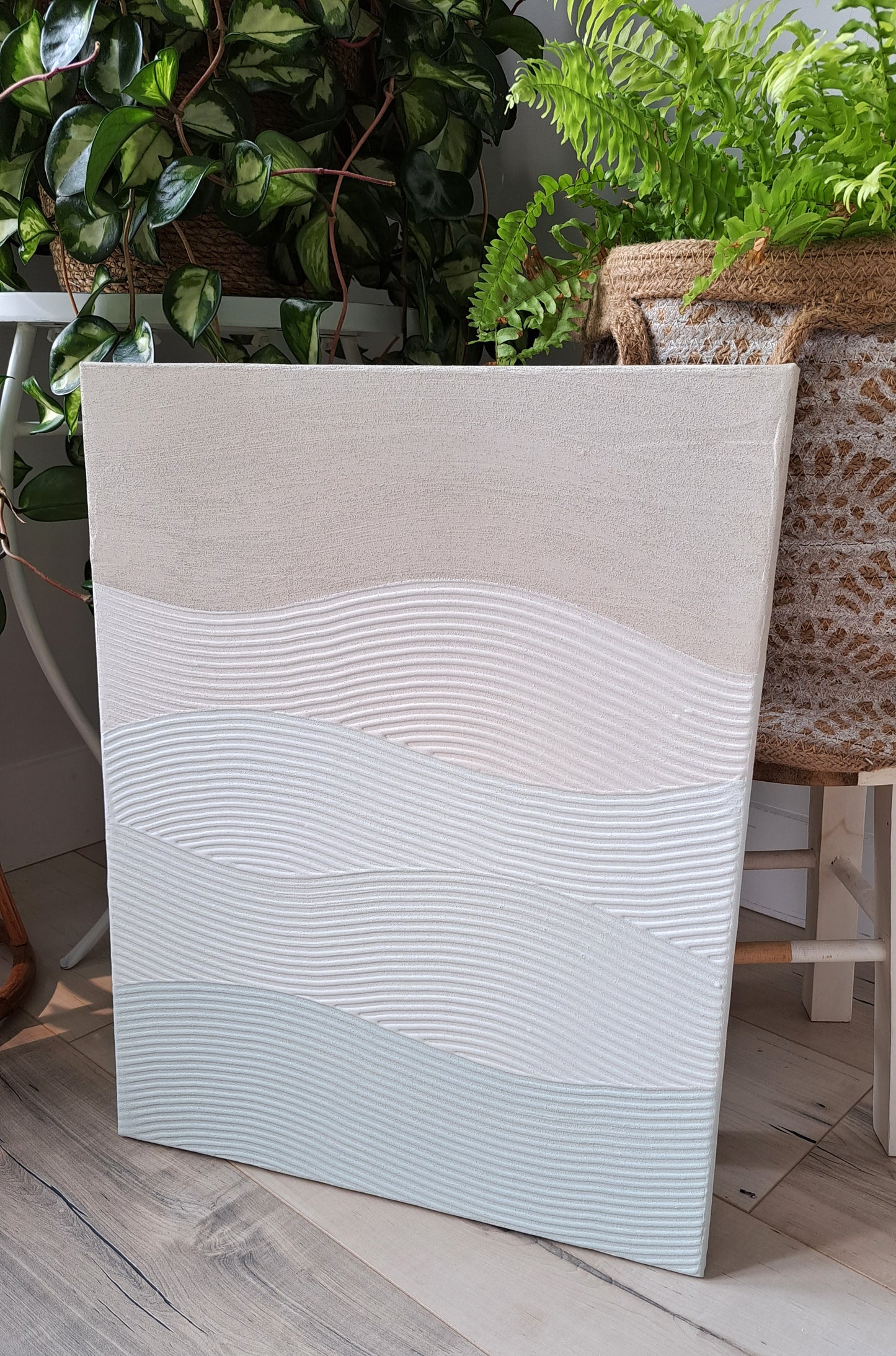 This gradient wave textured piece is made with sand for an authentic beachy feel. Highly textured, with colours ranging from light beige to light blue.