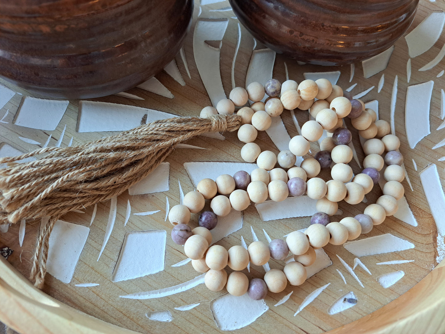 Weathered Landing's Lepidolite stone and wooden bead garland. Perfect in a farmhouse, country, boho, coastal, or rustic home. Find a variety of home decor and garlands at Weathered Landing. Located in Komoka, Ontario, local delivery is available. Shipping to Canada and the US.