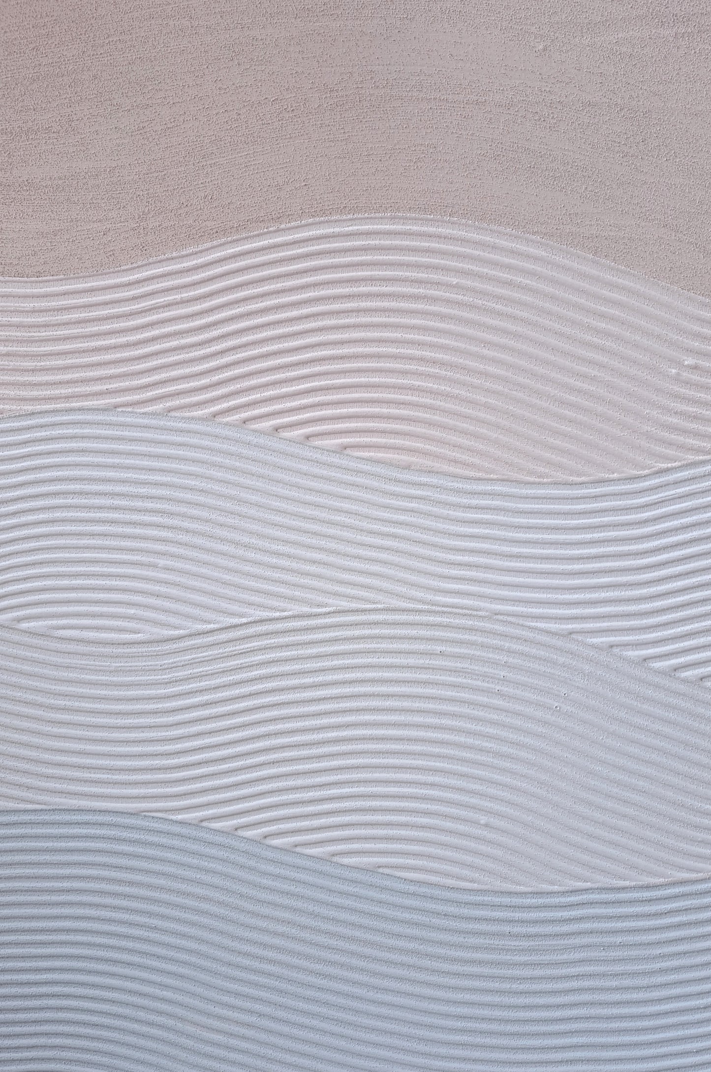 This gradient wave textured piece is made with sand for an authentic beachy feel. Highly textured, with colours ranging from light beige to light blue.