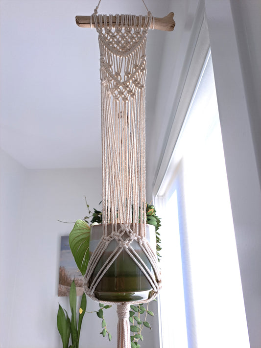 Weathered Landing's handmade driftwood macrame plant hanger that fits a 4 inch pot best. Display your hanging plants in this intricate boho plant hanger. Adds texture and natural elements to your space. Located in Komoka. Shipping to Canada and US.