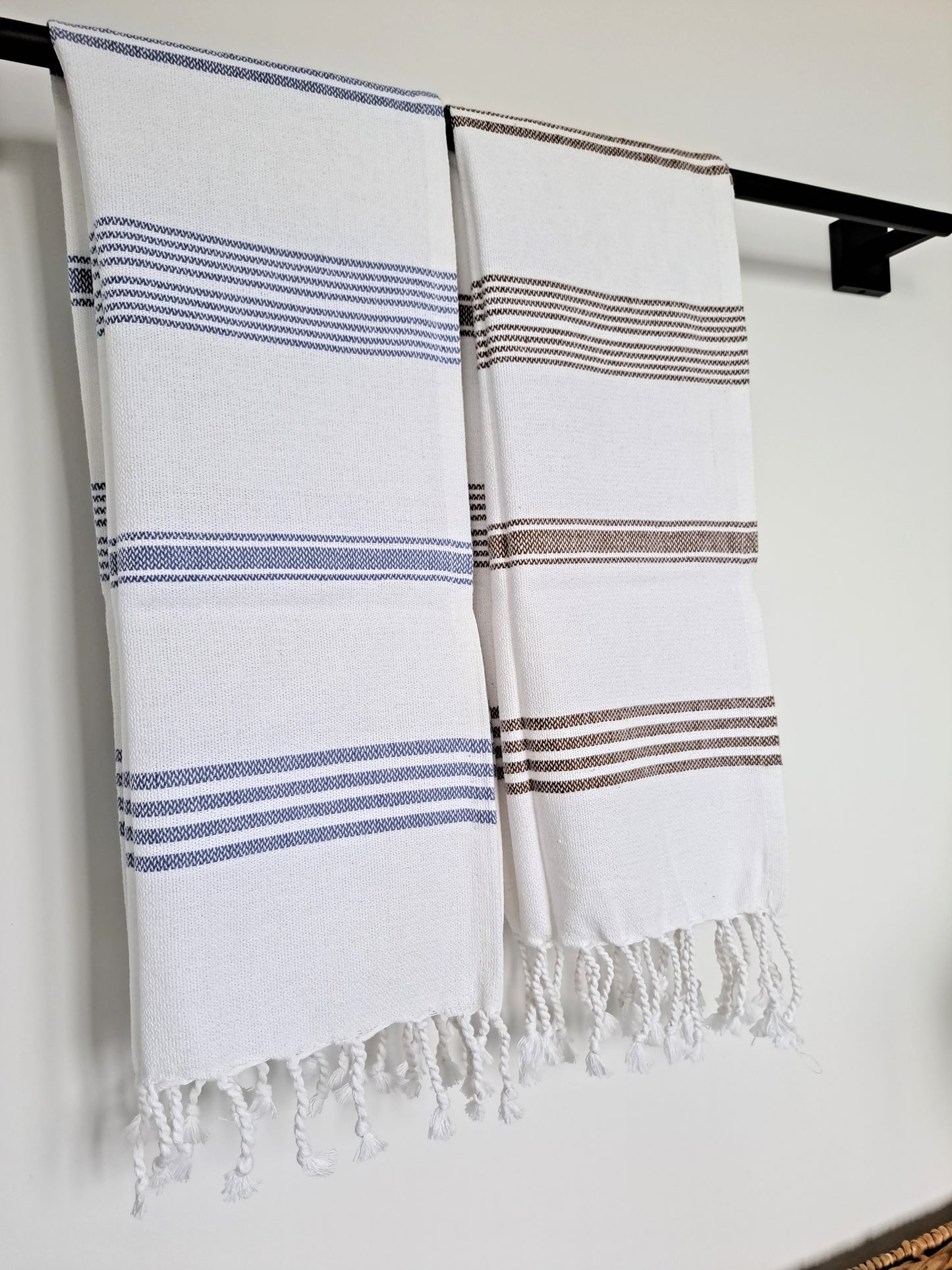 These brown striped handwoven hand towels work perfectly for a farmhouse style, adding an artisanal touch to your space. Great for the kitchen or bathroom.